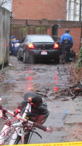 Police approach abandoned vehicle