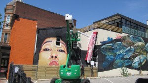 Artists Gaia and Nanook at Work on Barracks Row Mural