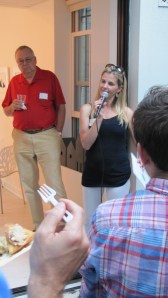 Amanda Clarke, Owner of Tabula Rasa, Thanks Frager's Supporters.  Also pictured is Gary Peterson of Capitol Hill Community Foundation