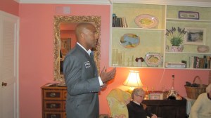 Thompson addresses residents in the Eastern Market neighborhood