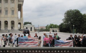 Sign Holders Providing a Back Drop for Television Cameras