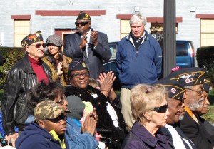 Neighbor and former Post Commander Leonard Hacker (left rear) participated in the event