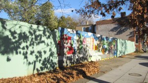 Mural-ed Fence Behind which Frager's New Structure Will Rise 