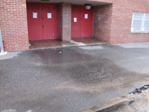 Sheets of Water Flow from the West Side of the East Hine Building