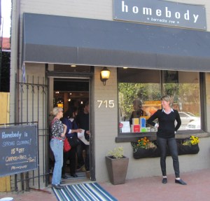Mara interacts with customers outside the store on Saturday. 