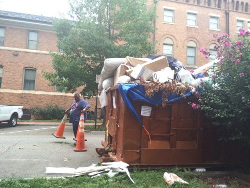 City Workers Clean Up Overflowing Dumpster behind Marine Barracks on 9th Street, SE