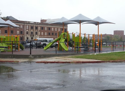 Hill East Residents Say the Open Air Drug Market Operates on the Curb at End of the Building in the Background.  