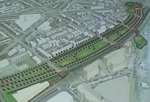 Concept C.  4 lanes separated by broad greenspace/park.  No residential but parking for buses.