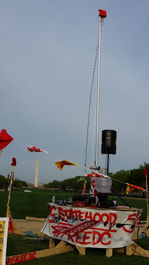 Sunday morning, c. 8:00am.  The Liberty Pole, with its wooden base having been removed overnight for safety reasons.  