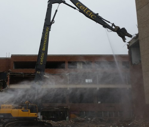 View of demolition of Hine Jr. High School, facing east.