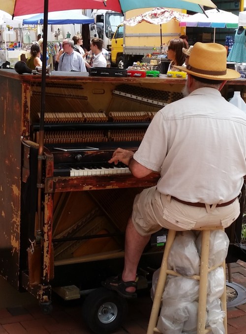 Joel Bailes at the rolling piano - note wheels.
