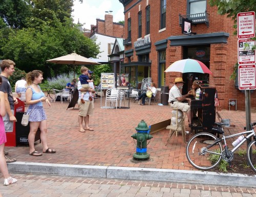 Core members of The Capitol Hillbillies Jam at Eastern Market Sunday afternoon.