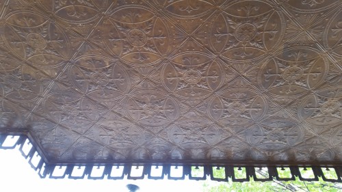 While you're checking out that building permit for the Miracle Theater, look up and check out the fabulous pressed tin portico overhead.  