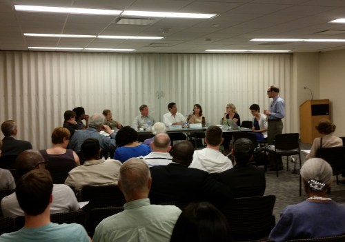 DDOT's Steve Strauss, standing, receives grilling by ANC6D Commissioners. 