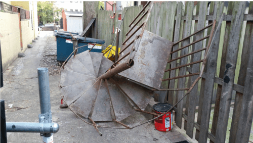 The alley to C Street behind  300 block of PA Avenue before re-paving this summer