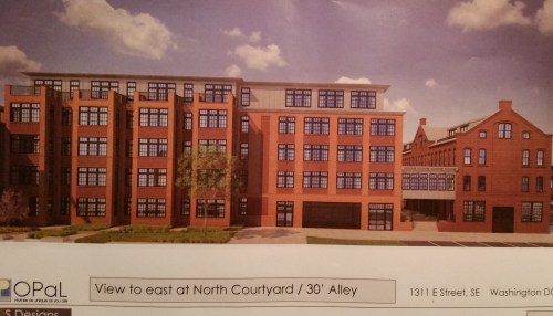 View looking north from the North Courtyard near the carriage house.  The bridge between the buildings will span the southern end of the "Southern Courtyard" depicted below.  