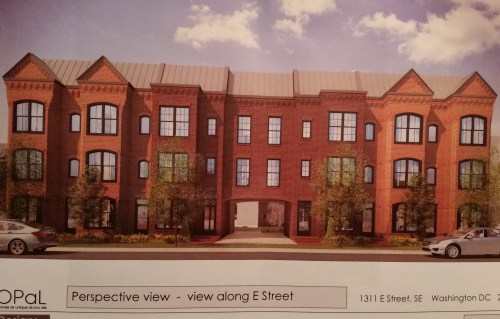 Rendering of the view from E Street.  The pass through permits resident and public access to the "North Courtyard."  Just visible through the opening is the single carriage house in the project - which Ruppert says zoning officials referred to as the "jewel" of the project.  In order to provide the pass through, designers had to eliminate one unit.  