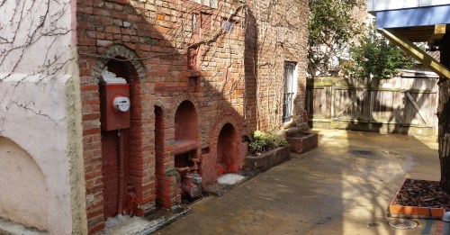 To put the structure in context, the tree house overhangs the portion of the alley seen here