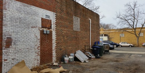 ...and onto Independence on the other, and seems likely to encourage temporary parking while shopping.  Pranksters have altered the "No Loitering" and "No Drinking" signs.  