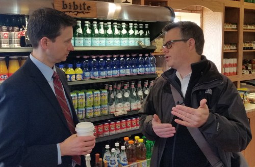 Daniel Ridge engages Councilmember Charles Allen at Allen's regular  meeting with Capitol Hill residents at Radicci.