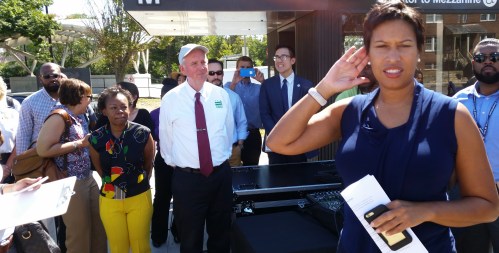 The Mayor's Hill East Walkabout started at the Stadium-Armoury Metro.  Bowser takes a question from the press at the beginning of the tour.  