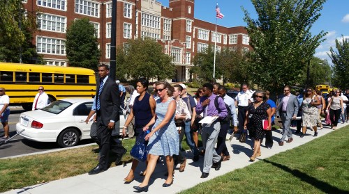 The tour included a walk-by of Eastern High on East Capitol Street on the way to 15th and Independence, a focus of community concerns.