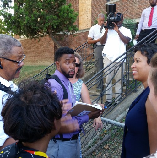 Hill East activist Francis Campbell (far left) gets some face time with Bowser to lobby for more affordable/senior housing at the Boys and Girls Club site. 