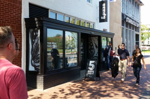 The sign in front of the Barracks Row &pizza on Sunday afternoon says, "5 days 'til we open"
