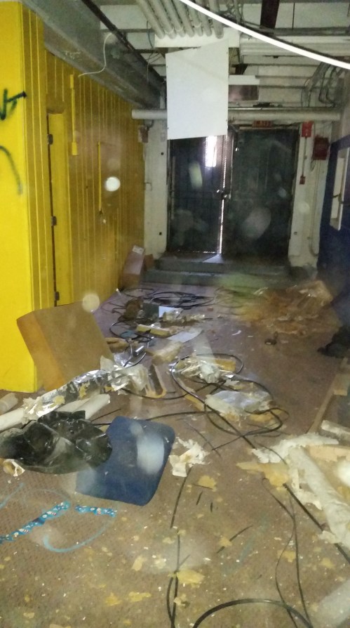 Back up stairs, through rooms filled with debris.