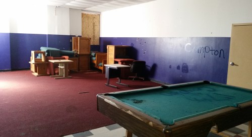Upper floor, south side.  Pool table with pool balls long gone to a private collection.