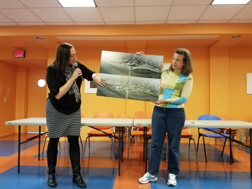 Jennifer Iwa of EventsDC (left) revealed a plan for a new road connecting Benning Road and Barney Circle.  ANC6B Commissioner Denise Krepp, at right, responded, "No."